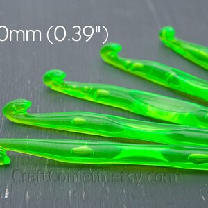 May include: A set of four bright green crochet hooks, each measuring 10mm (0.39").