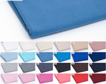 May include: A swatch card with 24 different colored fabric samples. The samples are arranged in a grid of 6 rows and 4 columns. The colors include white, light blue, light pink, yellow, orange, green, blue, red, brown, and gray.