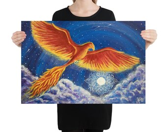 May include: A fiery orange phoenix with red and yellow wings flies through a dark blue night sky with white clouds and a white moon. The moon is surrounded by a white mandala.