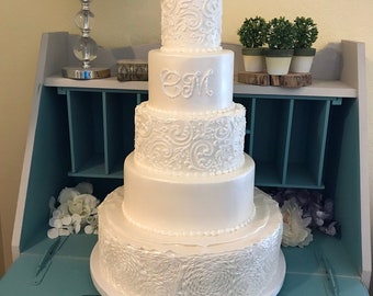 Five tier faux wedding cake