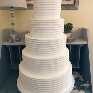 Five tier horizontal lines faux wedding cake