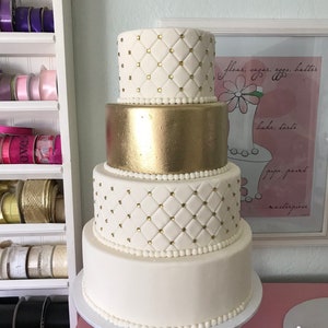 Four tier faux wedding cake