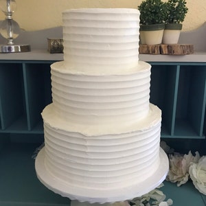 Three tier horizontal lines texture faux wedding cake