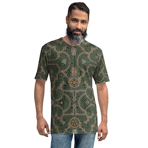 May include: A green and gold long-sleeved t-shirt with a geometric pattern. The pattern features a repeating design of interlocking circles and squares.
