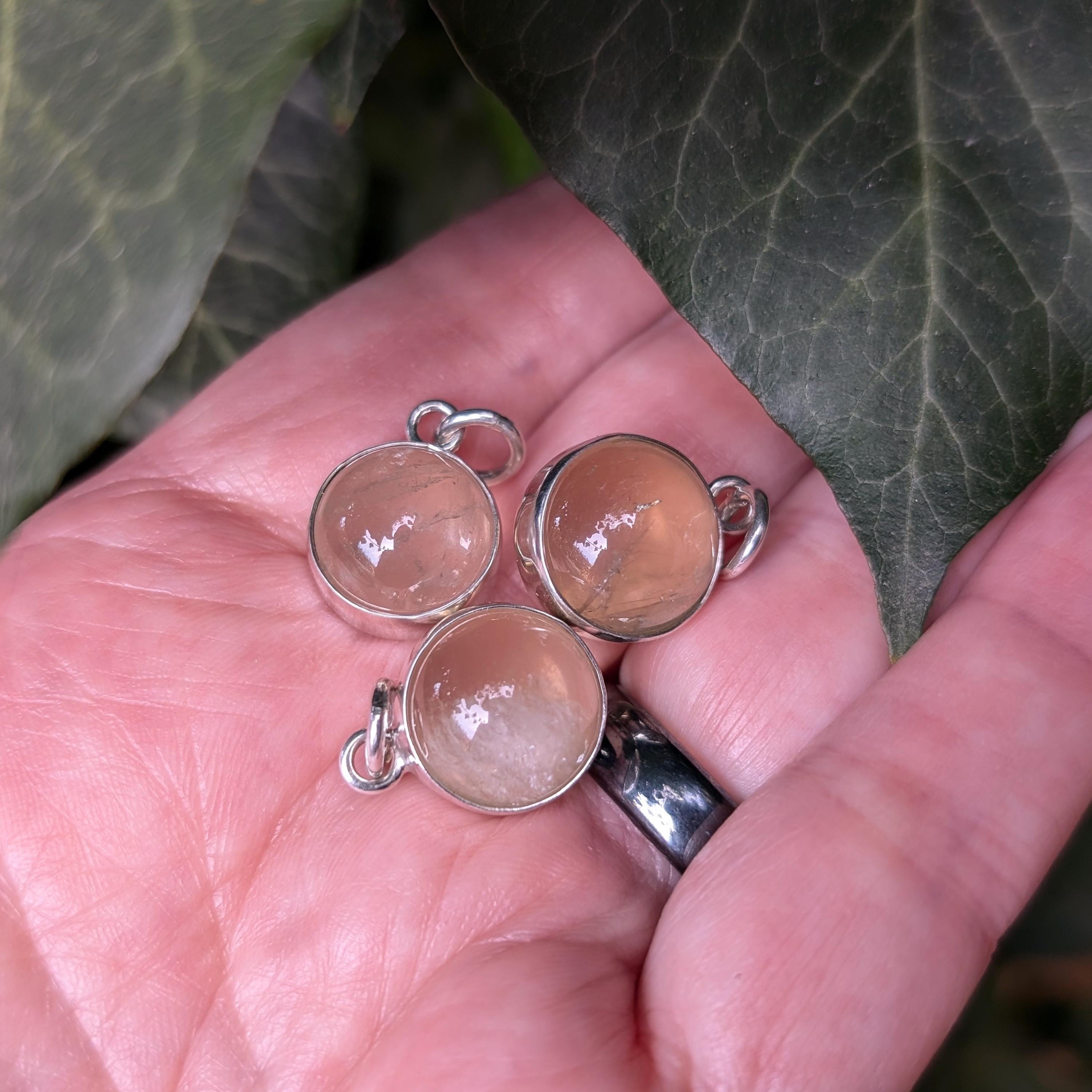 Full moon / Pool of light pendant with quartz crystal sphere, handcrafted in sterling silver