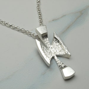 Unusual silver cross pendant