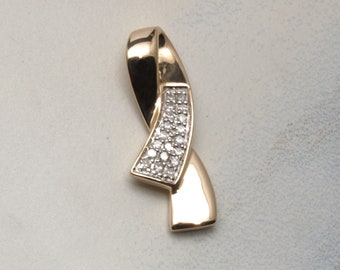 Beautiful gold and diamond ribbon pendant