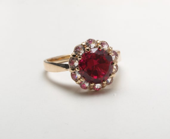 Lab grown ruby cluster ring in 14ct gold - image 1
