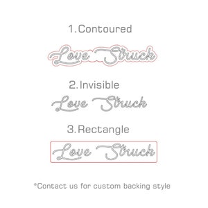 May include: Three different styles of backing for a "Love Struck" sign. The first style is contoured, the second is invisible, and the third is a rectangle.