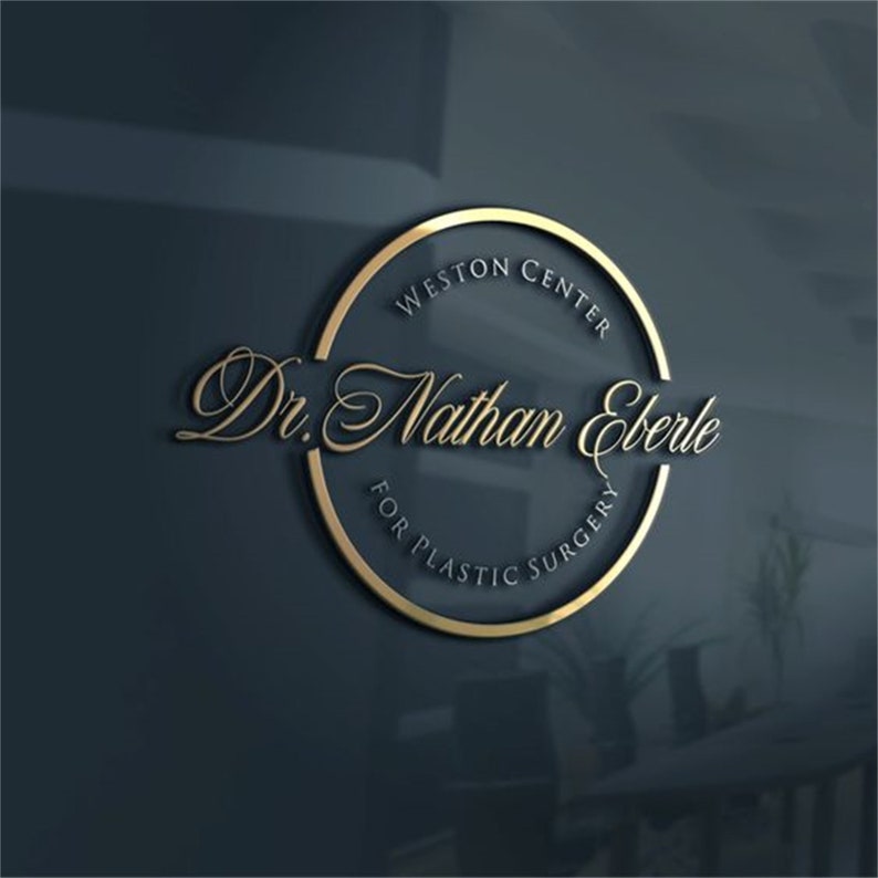 May include: A gold logo on a dark blue background. The logo features the text "Weston Center" at the top, "Dr. Nathan Eberle" in the centre, and "For Plastic Surgery" at the bottom, all within a gold circle.
