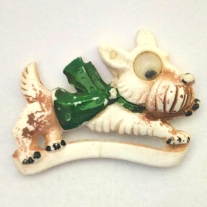 Art deco celluloid dog brooch