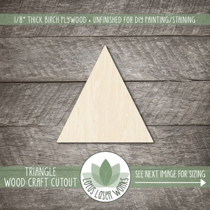 May include: Unfinished birch plywood triangle cutout, 1/8 inch thick, for DIY painting or staining. The image includes the text "TRIANGLE WOOD CRAFT CUTOUT" and "SEE NEXT IMAGE FOR SIZING".