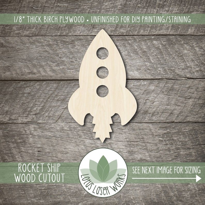 May include: A wooden rocket ship cutout, unfinished and ready for painting or staining. The cutout is made from 1/8 inch thick birch plywood. The rocket ship has three round windows and a pointed nose.