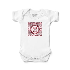 May include: White baby onesie with a maroon University of Chicago logo and the words "UCHICAGO MAROONS" repeated in a pattern.