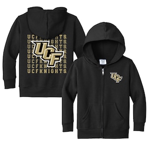 May include: Black zip-up hooded sweatshirt with the UCF Knights logo on the front and back. The back features a larger logo and the words "UCF KNIGHTS" repeated vertically in gold. The front has a smaller logo on the chest.