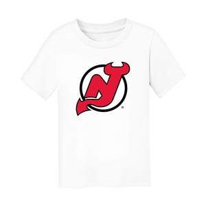 May include: White t-shirt featuring the New Jersey Devils logo. The logo is a red "N" with a devil's horn, outlined in black, and encircled by a black ring. The shirt is made of a soft, comfortable material.