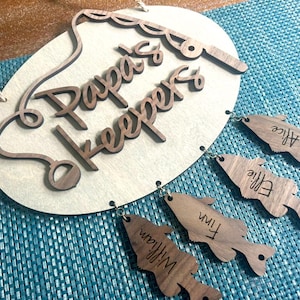 Papa&#39;s Keepers fishing themed personalized hanging wooden sign