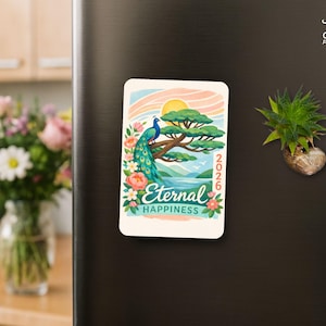 May include: A rectangular magnet with a colorful illustration of a peacock perched on a tree branch, with the text "Eternal Happiness" and the year "2026". The background features a sunset, mountains, and flowers.