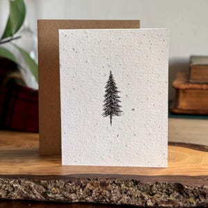 Carte de pin avec papier de graines de fleurs sauvages à planter pour les fêtes dessinées à la main