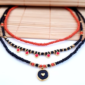 necklace set boho layered, layering necklaces with boho charms, red glass bead choker necklace, handmade black gold heart medallion pendant