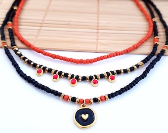 necklace set boho layered, layering necklaces with boho charms, red glass bead choker necklace, handmade black gold heart medallion pendant