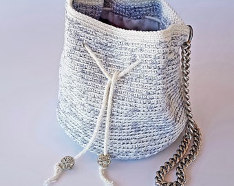 white crochet pouch bag with chain