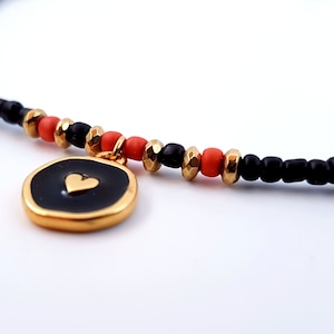 heart medallion layered necklace with beads
