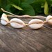 see more listings in the Cowrie Shell Jewelry section