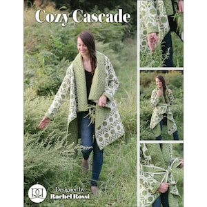May include: A woman wearing a green and white patterned coat with the text "Cozy Cascade" at the top. The coat has a unique design and is designed by Rachel Rossi. The coat is open in the front and has a shawl collar.