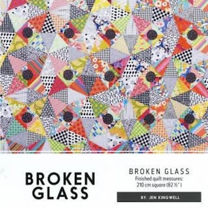 May include: A colorful quilt pattern with a geometric design featuring black circles and a variety of fabrics. The quilt is titled "Broken Glass" and measures 82 inches by 82 inches.