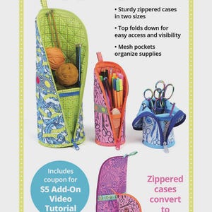 May include: A set of patterned fabric zippered cases that convert into standing organizers. The cases feature mesh pockets and fold-down tops for access. Text includes Flipping Out, Sturdy zippered cases in two sizes, Top folds down for easy access and visibility, Mesh pockets organize supplies, Includes coupon for $5 Add-On Video Tutorial, byannie.com, and Zippered cases convert to sturdy stands.