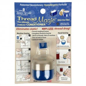 May include: Taylor Seville Originals Thread Magic thread conditioner in a blue and beige plastic container on a cardboard backing. The packaging features instructions for machine and hand sewing, stating it eliminates static and reduces thread drag.