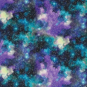 May include: A fabric print featuring a deep space galaxy theme with a dark background. The pattern displays swirling clouds of vibrant purple and bright teal colors, densely scattered with tiny white dots representing stars across the surface.
