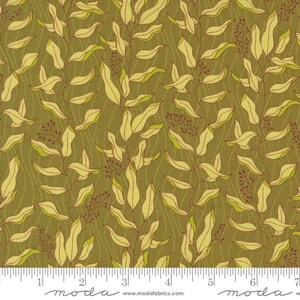 May include: A green fabric with a repeating pattern of yellow leaves and stems. The fabric has a subtle texture and a slightly faded look.