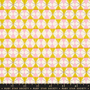May include: A fabric swatch featuring a repeating geometric pattern of mustard yellow and light pink triangles on a cream background. A black ruler at the bottom shows measurements in inches, with the text Ruby Star Society printed repeatedly.