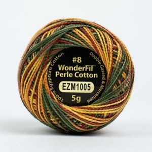 May include: A spool of #8 WonderFil Perle Cotton thread in a multi-colored pattern of green, orange, yellow, and red. The spool is labeled "100% Egyptian Cotton, Double Gassed & Mercerized, EZM1005, 5g".