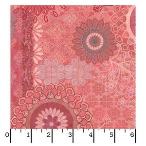 May include: A square fabric with a repeating floral pattern in shades of pink, red, and gray. The design includes large mandala-like flowers and smaller floral motifs. The fabric is measured with a ruler, showing a width of approximately 6 inches.