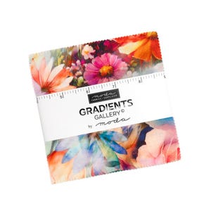May include: A square stack of fabric squares featuring a vibrant floral print with pink, orange, and blue watercolor-style petals. A white paper band wraps around the center, printed with the text Moda Fabrics Supplies Gradients Gallery by Moda.