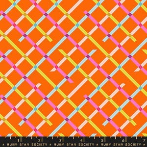 May include: Orange fabric with a colorful plaid pattern. The design features intersecting lines in light blue, pink, yellow, and white, creating a vibrant and geometric design. The fabric is suitable for quilting and sewing projects.