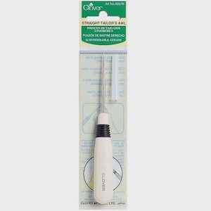 May include: A Clover brand straight tailor's awl, model 485/W, featuring a sharp metal point, a white handle with a black ribbed grip, and a clear protective cap. The tool is packaged on a vertical card with the text Clover, Art No. 485/W, and Straight Tailor's Awl.