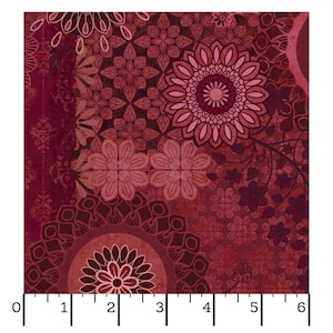May include: A fabric with a complex floral pattern in shades of burgundy, maroon, and pink. The design features large, stylized flowers, mandalas, and other geometric shapes. The fabric is measured with a ruler in inches.