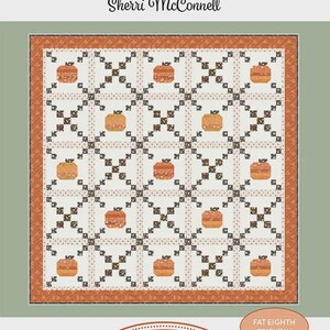 May include: A quilt pattern titled Pumpkin Patch by A Quilting Life Designs by Sherri McConnell. The quilt features a grid of white squares with orange pumpkin motifs, separated by dark floral sashing, all framed by an orange patterned border.