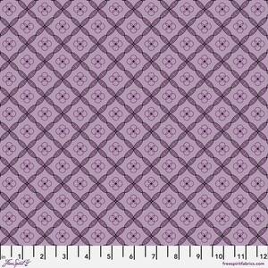 May include: A fabric with a repeating pattern of intersecting ovals and four-petal flower shapes in shades of purple and black. The design is set against a light purple background. The image includes a ruler along the bottom edge, with measurements in inches.
