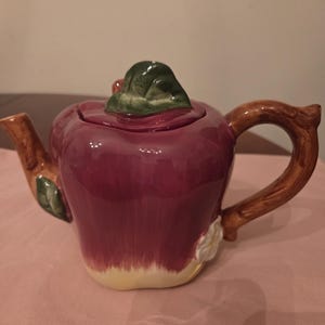 May include: A rustic wooden sign with the text "Welcome to our home" in white lettering. The sign features a distressed finish and a simple, inviting design, perfect for a front porch or entryway.