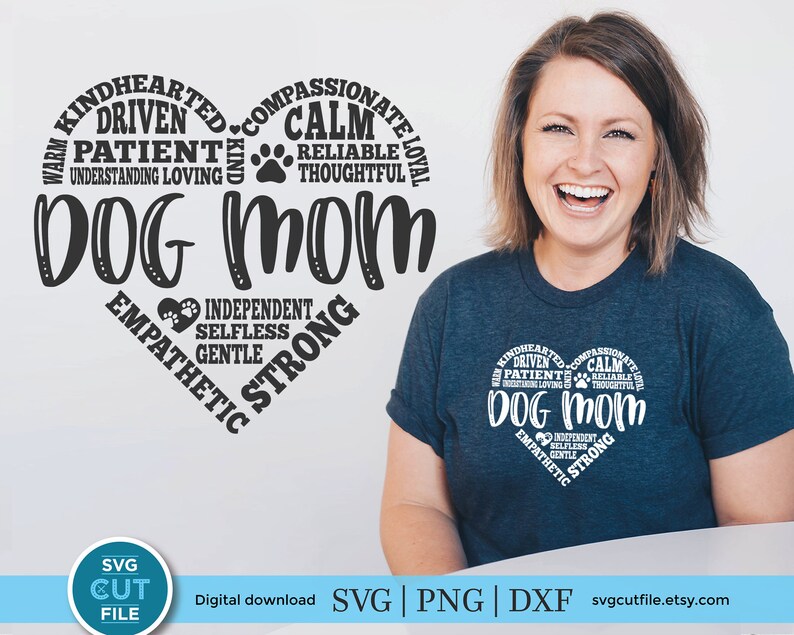 May include: A white t-shirt with a black heart design. The heart is filled with text that describes the qualities of a dog mom. The text includes words like "kindhearted", "driven", "patient", "understanding", "loving", "compassionate", "calm", "reliable", "thoughtful", "loyal", "independent", "selfless", "gentle", "empathetic", and "strong".