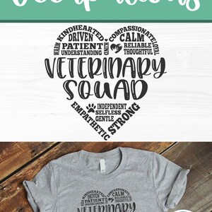 May include: A gray t-shirt with a black heart-shaped design. The heart is filled with words describing the qualities of a veterinarian, such as "kindhearted", "driven", "patient", "calm", "understanding", "thoughtful", "independent", "selfless", "gentle", "strong", and "empathetic". The words "Veterinary Squad" are in the center of the heart.