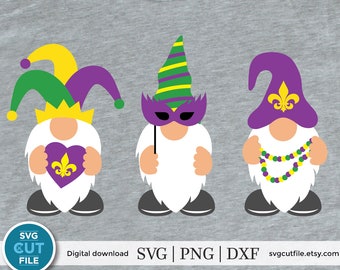 May include: Three Mardi Gras gnome designs in purple, green, yellow, and white. One gnome wears a crown and holds a heart with a fleur-de-lis. Another holds a mask, and the third wears a hat and beads.