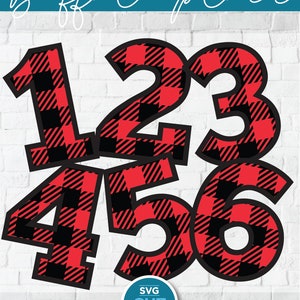 May include: Six numbers, 1 through 6, in a buffalo plaid pattern. The numbers are red and black and are outlined in black. The numbers are on a white brick background. The text "SVG CUT FILE" is in a blue circle.
