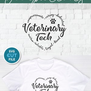 May include: A white t-shirt with a black circle design that says "Veterinary Tech" with a paw print and the words "compassionate, caring, dedicated, warm, reliable, loyal, kind" around the circle. The t-shirt is on a white brick background with a red and black plaid shirt and blue jeans.