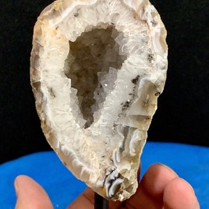 Brazilian Agate Geode Half on Black Metal Stand